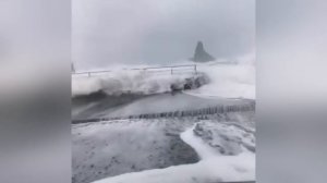 Huge tsunami-sized waves crash the coast of Sicily, Italy