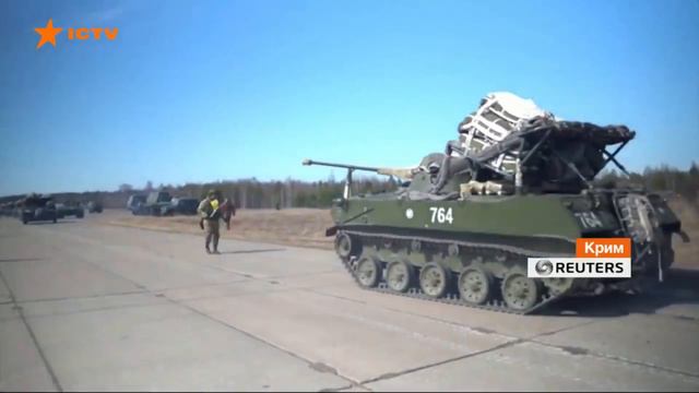 Россия стягивает тяжелую технику в оккупированный Крым смотреть онлайн