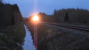 Finnish freight train 4467 passes Multamäki level crossing