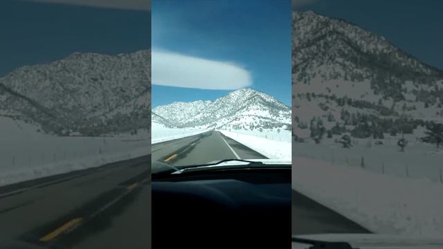 A cloud and a mountain meet