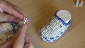 Свяжу такие еще взрослые. Тапочки для мальчика на 2- 3 годика спицами.