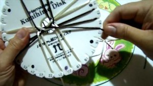 Плетеный браслет Кумихимо.