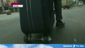 В Китае придумали новый вид транспорта -- гибрид скутера и чемодана