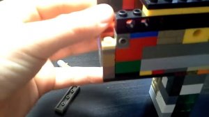 Работающий пистолет без резинок и лего техник!!!!!!!Только обычное лего!!!!!!!!!!