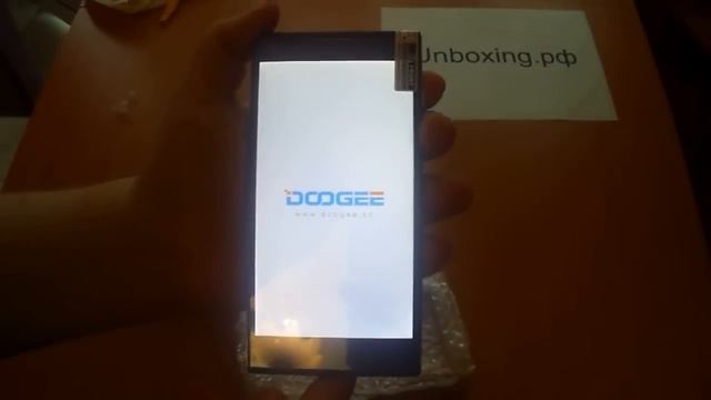 Doogee DG550 распаковка телефона смотреть онлайн