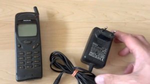 Nokia 3110 type NHE-8 retro style mobile cellphone from pre-smartphone period with charger test