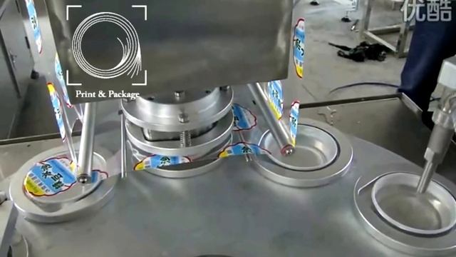 Ротационная машина для розлива в стаканчики масла, воды, сока, желе и с заваркой платинкой или плен смотреть онлайн