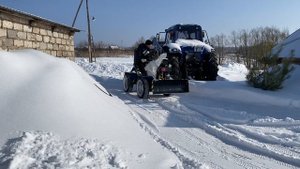 Мини трактор против снега.