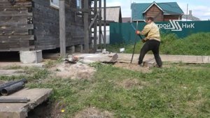 Подъём дома на плиты близ Архангельска