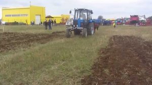 Борона дисковая БДМ 2,1х2 КС производства ООО "БДТ-АГРО" с трактором Беларус 82