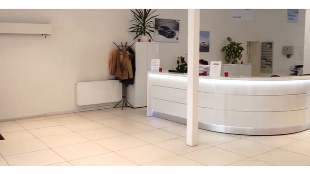 Motor Elektrik in Chemnitz mit weißen Empfangstheken in Hochglanzausführung смотреть онлайн