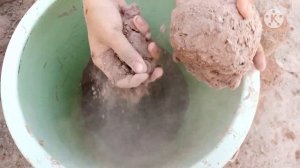 Pure red Dirt big buckets crumbling in water + paste play brown gritty red Dirt dry dusty crumbling
