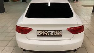 Оклейка Ауди в белую матовую пленку Arlon.