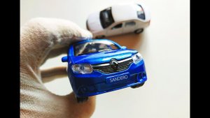 Про МАШИНКИ. Модельки Рено Логан и Сандеро / Renault Logan и Sandero распаковка и обзор.
