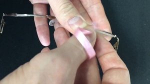 Вставка линзы в оправу на леске. Мастерская Оптикус.