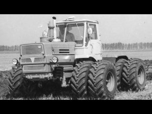 испытания плуга трактором т-150к . на кадрах техника ПКСП-6-35Г плуг. Колхида, УАЗ-452, 1976год