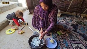 The Chavil family plasters the house wall to strengthen the house and protect it from the cold