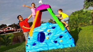 Diana and Roma pretend play climbing with activity toys