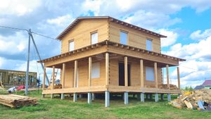 Двухэтажный дом 10 на 10 из бруса с угловой террасой в Сыктывкаре  Обзор дома от Центра Домостроения