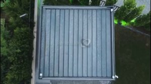 Отдельностоящая веранда премиум класса от компании SunArts с гильотинным остеклением