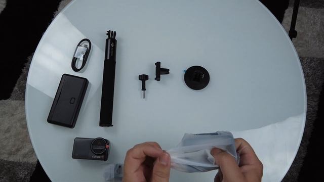 What's in the box? An action camera. dji osmo action 3 adventure combo unboxing. смотреть онлайн