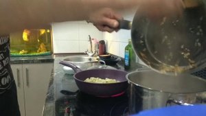 Суп из пельменей, жареной картошки с луком и грибами.