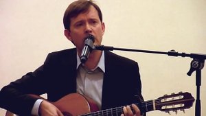 Олег Погудин. Музыкант играл на скрипке.
