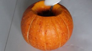 Тыква запеченная целиком в мультиварке с пшеном