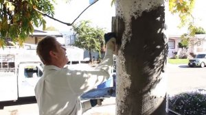 Applying stucco to round stucco pillars