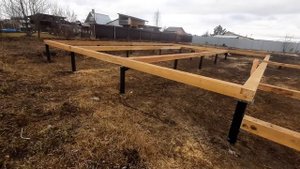 Обвязка брусом свайно-винтового фундамента для жилого дома 12м на 15м