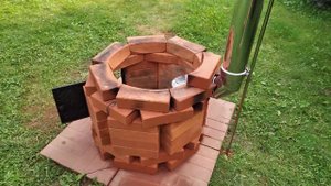 кирпичная печь для казана 22 л. а также очаг для костра.