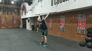 Наклоны с грифом над головой рывковым хватом