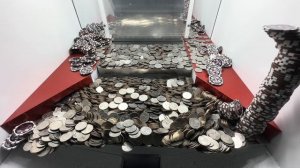 3000 quarters at once inside the high limit coin pusher