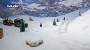 Bruder Official Land Rover Merchandise Defender Station Wagon with Snowmobile Toy Reviews