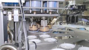 Упаковочное оборудование. Фасовка сметаны в стаканчики на фасовочно-упаковочном станке ПАСТПАК 4Р