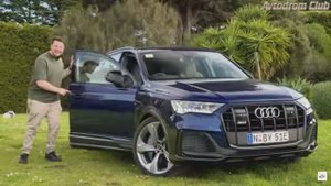 Обзор Audi SQ7 2024 года выпуска: Добавление бензинового V8 с двойным турбонаддувом - это БЕЗУМИЕ.