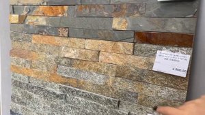 Декоративные панели из камня для отделки стен за печкой