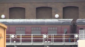 Hogwarts Express train leaving Diagon Alley in Wizarding World of Harry Potter at Universal Orlando