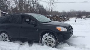 Toyota RAV 4 in Snow off  road.