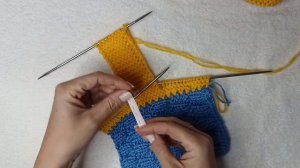 Комнатные сапожки (носочки) на двух спицах,без шва по подошве