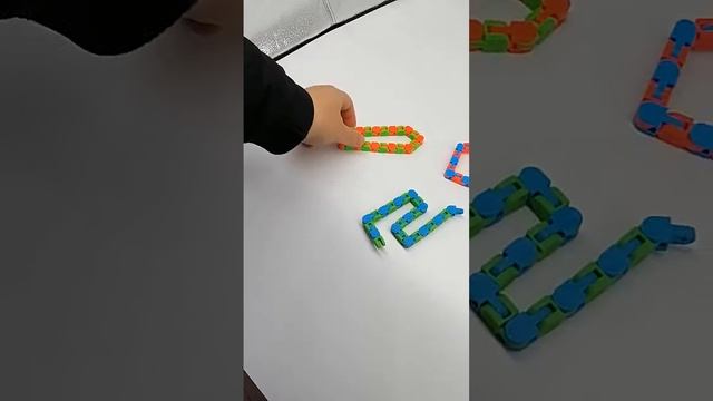 Классическая сенсорная игрушка-фиджет змейка из 24 блоков с защелкой для снятия стресса смотреть онлайн