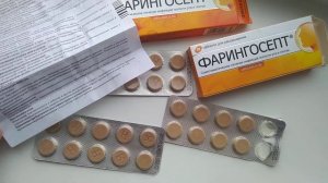 Таблетки для рассасывания ФАРИНГОСЕПТ.