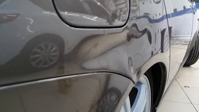 Ремонт вмятины без покраски на заднем крыле автомобиля Лада Приора