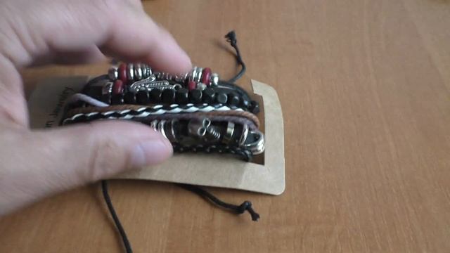 Браслет мужской "фенечка" из 4 штук Череп Ладонь эко кожа L-20-25см смотреть онлайн