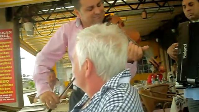 Being serenaded in Balkan restaurant in Costa Adeje Tenerife