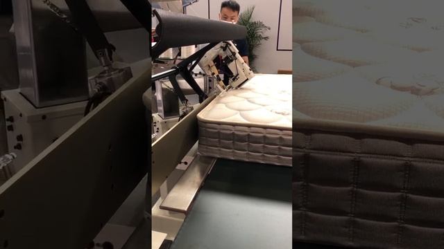 Mattress tape edge sewing machine