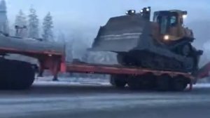 Неудачный спуск бульдозера с трала