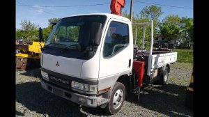 Японский грузовик Mitsubishi Canter 2000 года выпуска, бортовой с краном.