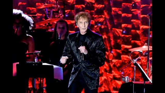 Barry Manilow performs onstage during the Clive Davis and Recording Academy Pre-GRAMMY Gala
