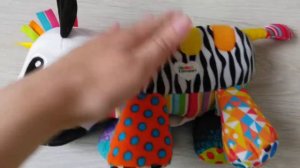 Музыкальная игрушка Lamaze Зебра что подарить ребенку в полгода, игрушки для ребенка в 6 месяцев